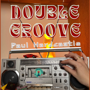 Double Groove Paul Hardcastle, a hand tunes an 80's boombox to the correct station